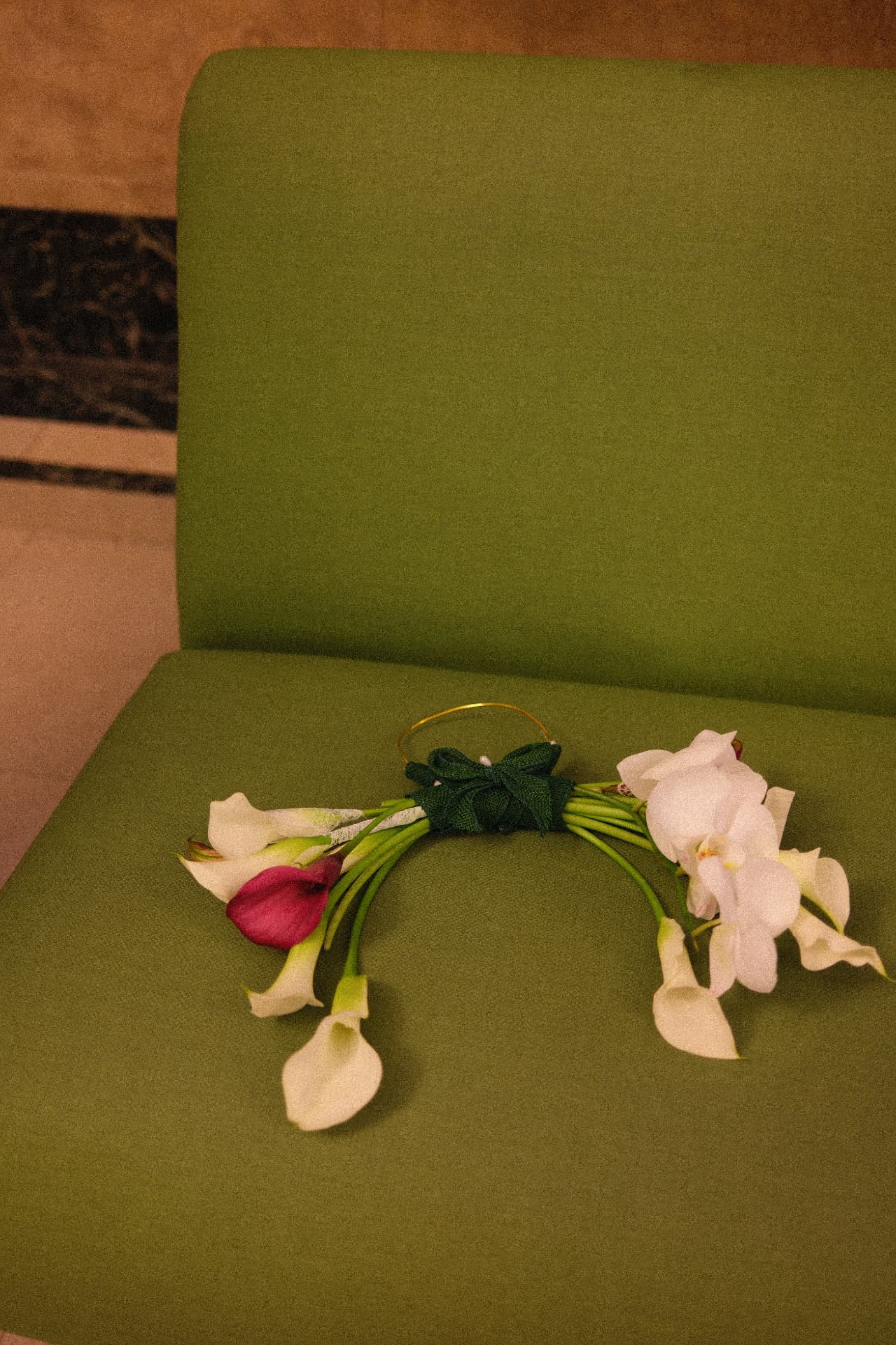 A sculptural calla lily and orchid piece by noonchi by bex